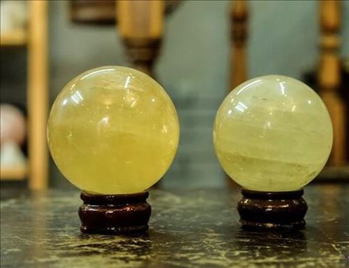 qua cau phong thuy hop menh Tho vang